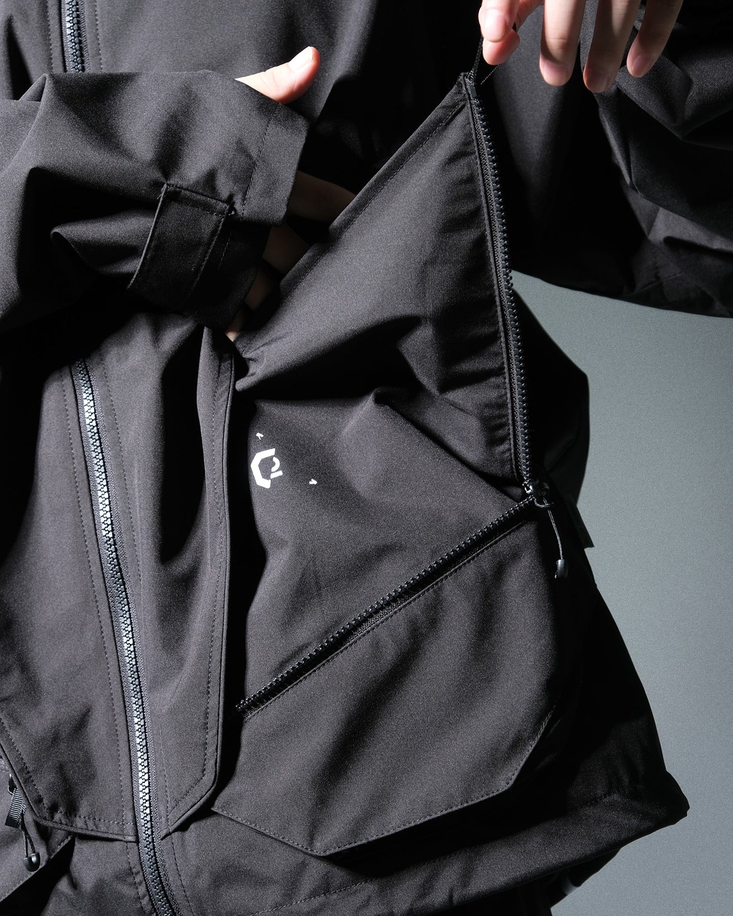 A24-OI-J OCTO X IONISM Ream Windbreaker (Black)